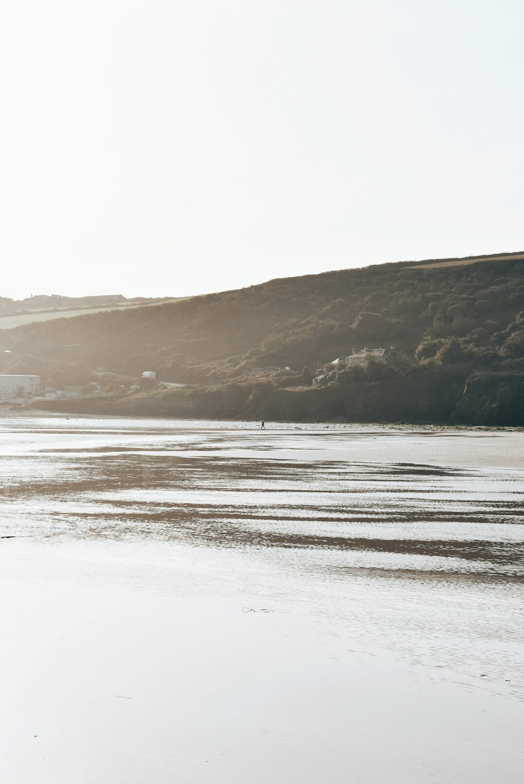 woman walking on empty beach